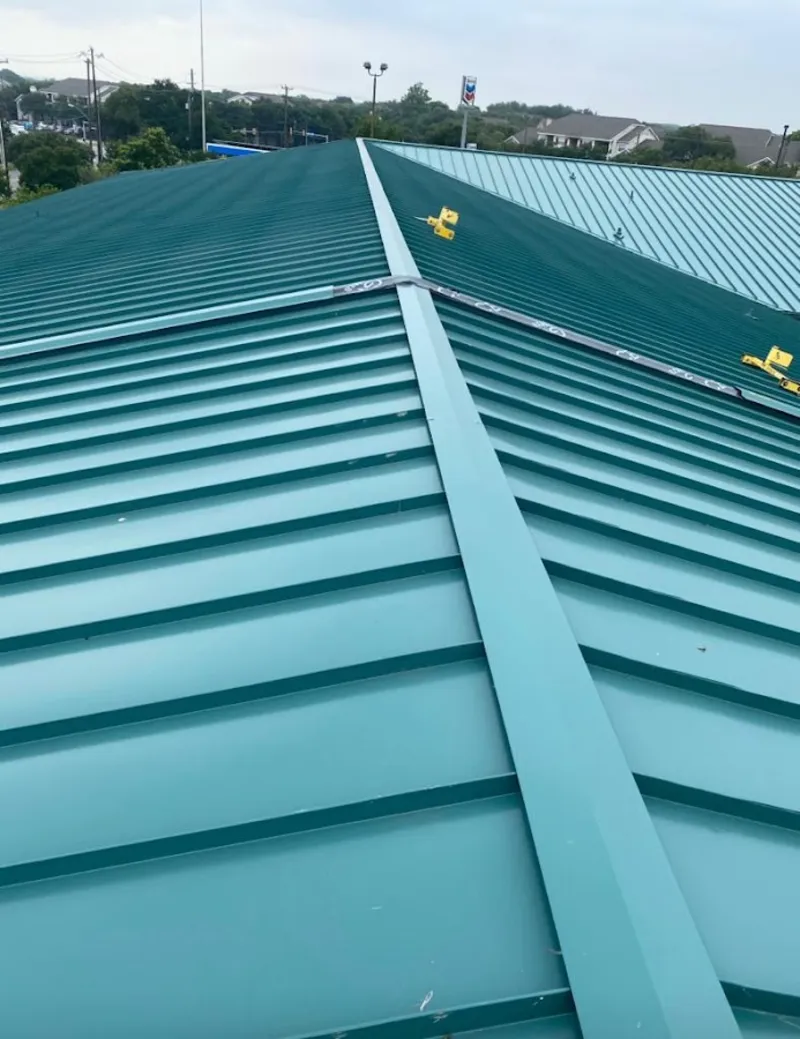 Green commercial metal roof ridge and valley for Metal Roof Repair in Elkridge